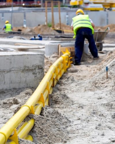 Trench With Yellow Ducts For Cable